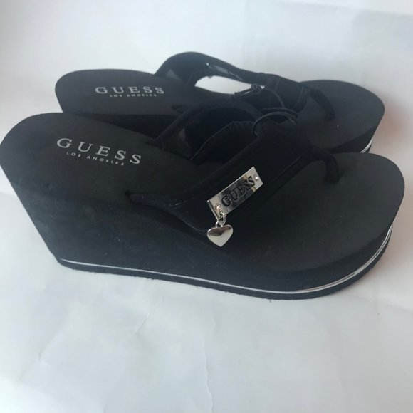 guess wedge flip flops